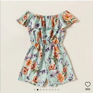 New with tags! Mommy and me matching rompers.